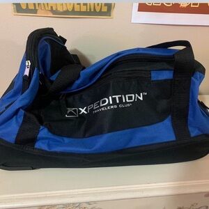•Blue and Black Expedition Travelers Club Duffel Bag On Wheels